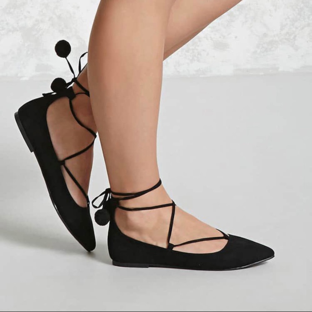 Lace up flats with pom poms